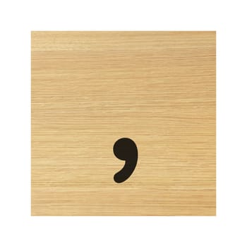 A comma sign wood block and on white with clipping path