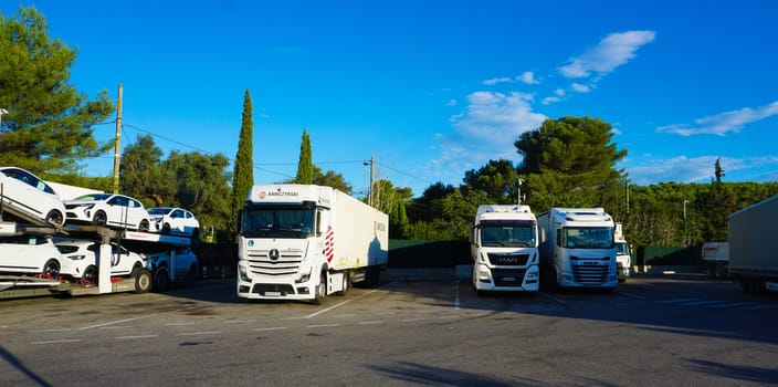Wroclaw, Poland - April 17, 2023: Trucks and Semi Trailer Trucks the Parking lot. Delivery Trucks. Cargo Shipping. Lorry. Industry Freight Truck Logistics Cargo Transport Concept.