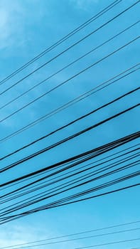 Busy Electricity pole with hanging cables around the city. Aerial small city in south east Asia before busy hours.