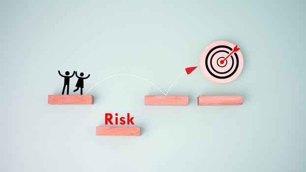 Block is arrange on green background and target board icon represents business obstacles and risks , Goal of business, Success and business target concept, Project management, company strategy.