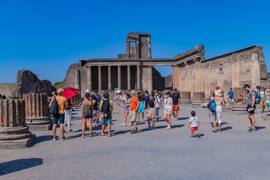 Pompeii, Italy - August 8, 2024: Ruins of a city. Pompeii is an ancient Roman city died from the eruption of Mount Vesuvius in 79 AD.