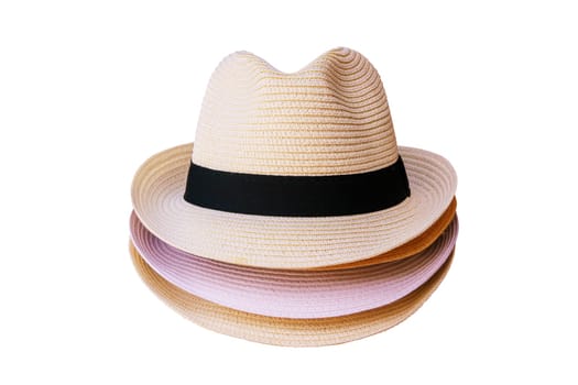 A pile of Vintage Straw hat fashion for the man isolated on white background. Clipping path.