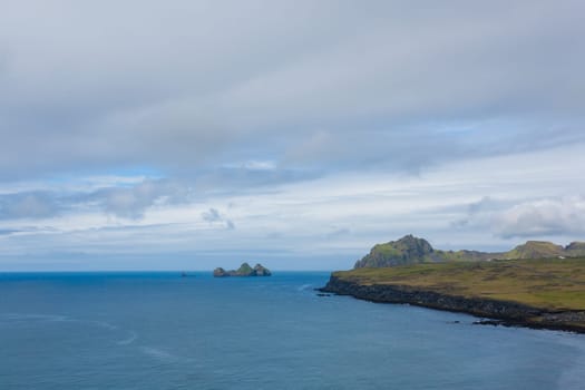 Westman Islands beach view with archipelago island in background. Iceland landscape.Vestmannaeyjar