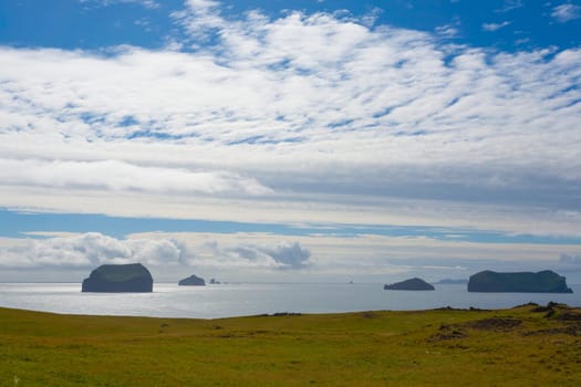 Westman Islands beach view with archipelago island in background. Iceland landscape.Vestmannaeyjar