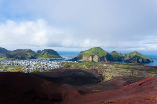 Heimaey town aerial view from Eldfell volcano. Iceland landscape. Westman Islands
