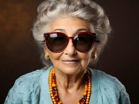 Funny happy old woman with sunglasses