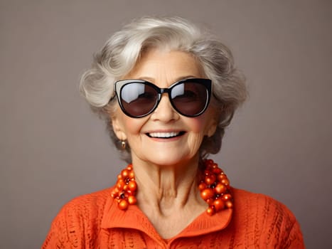 Funny happy old woman with sunglasses