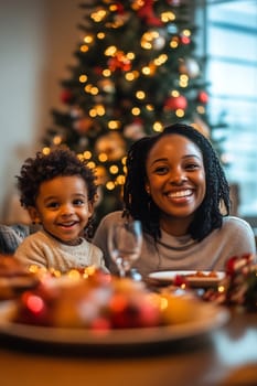 A mother and her smiling child enjoy a festive Christmas gathering at home, surrounded by treats and a glowing tree.