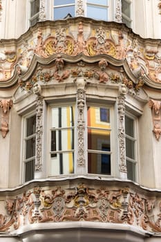 Innsbruck, Austria - February 26, 2023: Decoratve facade of  House Of Helbling (Helblinghaus), located at Herzog-Friedrich street