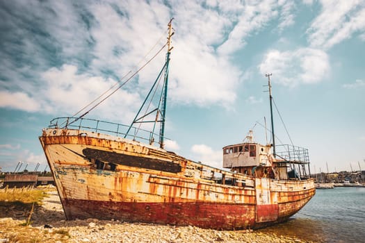 Wreck of an abandoned wooden fishing boat in the harbour of Camaret-sur-Mer, Brittany, France