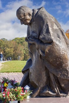 Czestochowa, Poland - October 18, 2024: Monument to Cardinal Stefan Wyszynski in front of 14th century baroque Jasna Gora Monastery (Light Mountain), famous pilgrimage center.