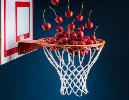 Cherries scoring in basketball hoop against blue background.