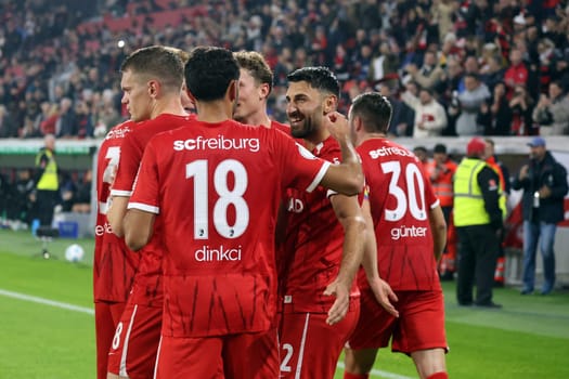Enjoy the moment: Vincenzo Grifo (SC Freiburg) scores from the penalty spot to make it 2-0 at half-time and celebrates his goal with his teammates in the 2024-25 DFB-Pokal match,2nd round: SC Freiburg vs Hamburger SV
