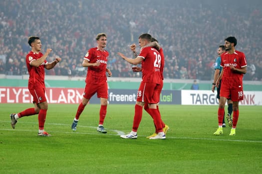 Matthias Ginter (SC Freiburg) has given Sportclub a 1-0 lead and is celebrated by his teammates for his goal in the 2024-25 DFB-Pokal match,2nd round: SC Freiburg vs Hamburger SV