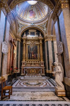 Victoria, Gozo, Malta - May 11, 2024: St. George's Basilica's majestic dome rises above Victoria, featuring beautiful murals and intricate Baroque details.