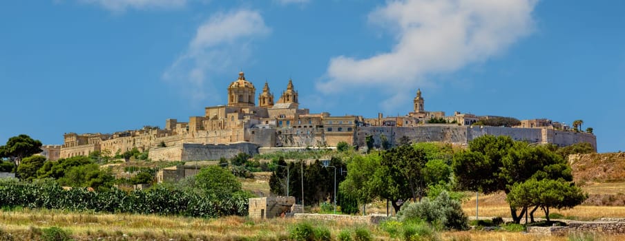 The fortified medieval city Mdina, the Silent City with ancient walls and bastion defenses. Malta travel destination.