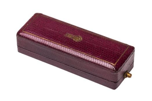 Ancient box. Antique brown jewellery gift box with rubbed gold decorations and a gold-plated press lock isolated on white. Clipping path. Old box to collect treasure.