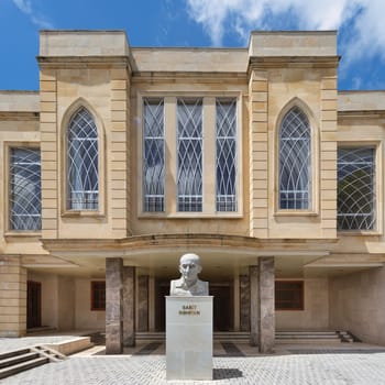 At the entrance of Sheki State Drama Theatre, a beautifully designed building, stands the statue of Sabit Rahman, showcasing his contribution to Azerbaijani culture
