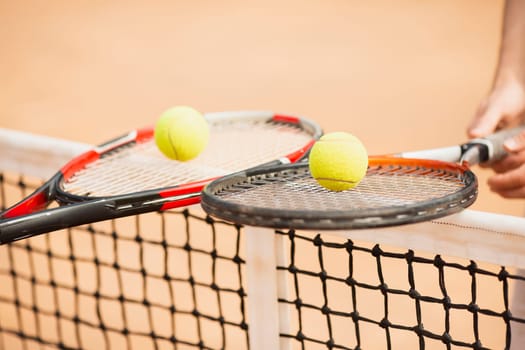 tennis couple holding tennis rackets. High resolution photo
