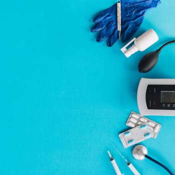 various medical equipments blue backdrop. High resolution photo