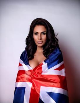 pretty young woman wrapped in Union Jack flag, AI generated image