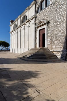 Rovinj, Croatia, Istria - September 29, 2023: Facade of 18th century baroque Saint Euphemia Church, main entrance