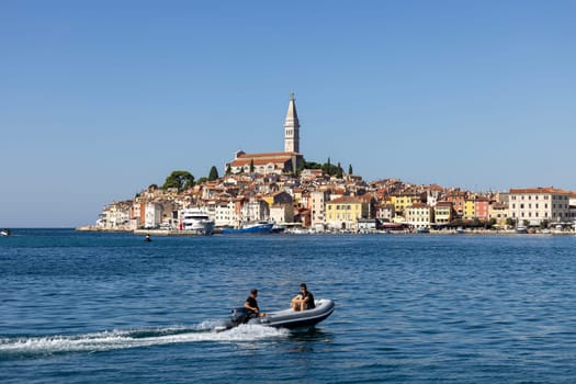 Rovinj, Croatia, Istria - September 29, 2023: Beautiful view from the South port Rovinj over Adriatic Sea to the peninsula with the Old Town and the tower of Saint Euphemia Church