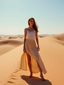 Beautiful fashion woman in desert