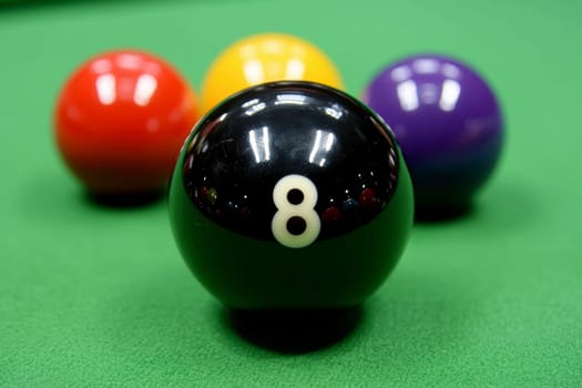 A black snooker ball with eight is placed on the green table, surrounded by other balls of different colors. The black billiard ball has no shadow and stands out against the background of bright green color, creating an atmosphere of excitement for playing. --chaos 30 --ar 3:2 --style raw --stylize 300 --v 6.1 Job ID: 652830ff-9d1f-4024-a8fb-e34ec01e607c
