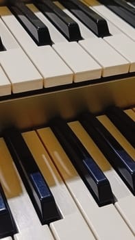 Close-up of an electronic organ in a cozy music room.