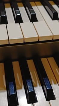 Close-up of an electronic organ in a cozy music room.