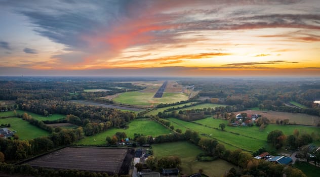 aerial view of former military Twente Airport in the Netherlands. The airport is currently uncontrolled and closed for scheduled passenger flights and military operations.