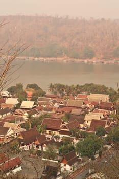 View from Phousi Hill onto the old town of Luang Prabang with the Mekong River in the background, Luang Prabang, Laos 2023