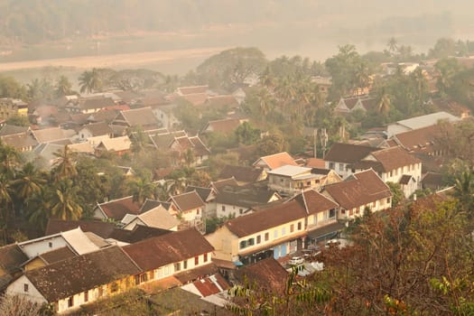 View from Phousi Hill onto the old town with the Mekong River in the background, Luang Prabang, Laos 2023