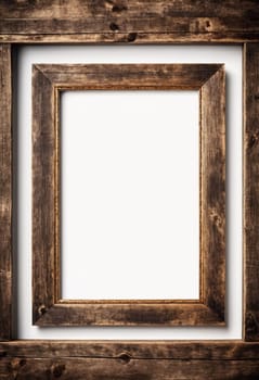 Rustic wooden frame features beautiful carvings and a weathered finish designed to hold art photographs set against clean white backdrop. A frame with intricate details against a white background. AI