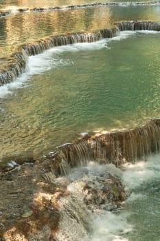 The pools, lagoons of the Kuang Si Falls, Waterfalls with its bright green water, Luang Prabang, Laos 2023