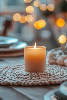 A softly glowing candle sits at the center of a beautifully arranged dining table, surrounded by warm bokeh lights for an evening gathering.