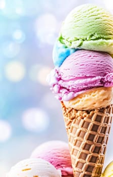 A stack of vibrant ice cream cones displays delightful flavors, creating a tempting treat on a warm, sunny day.
