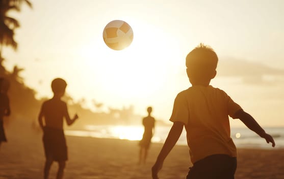 Silhouetted kids play volleyball on the beach as the sun sets, casting a golden glow over the scene.