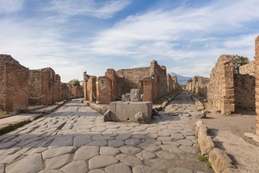 Street view of the city of Pompeii in Campania Italy. Pompeii is a ruin of acient Roman City near Naples in Italy.