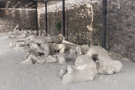 Plaster cast of the victims covered in ash in Pompeii, Italy