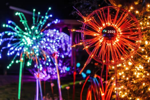 Bright LED lights create stunning patterns in a garden celebrating the festive spirit with vibrant colors and holiday cheer during winter.