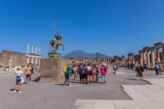 Pompeii, Italy - August 8, 2024: Ruins of a city. Pompeii is an ancient Roman city died from the eruption of Mount Vesuvius in 79 AD.
