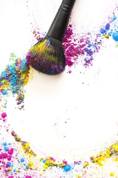 elevated view make up brush colorful compact powder white background. High resolution photo