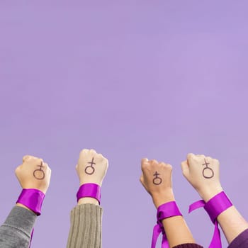 group female activists protesting together. High resolution photo