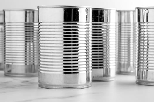front view tall tin cans. High resolution photo