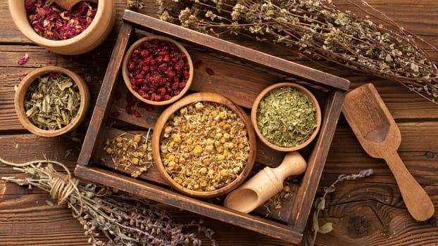 natural various herbs wooden box. High resolution photo