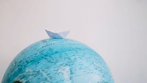paper boat globe. High resolution photo