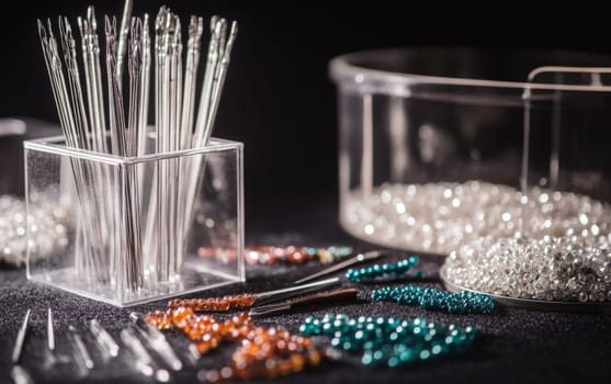 Assortment of colorful beads, needles, and jewelry making tools arranged on dark background, showcasing craft supplies for DIY accessories and handmade jewelry.