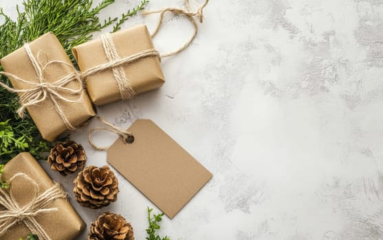 Kraft paper wrapped gifts with pine branches, pine cones, and blank tag on white textured background, showcasing sustainable holiday gift giving.